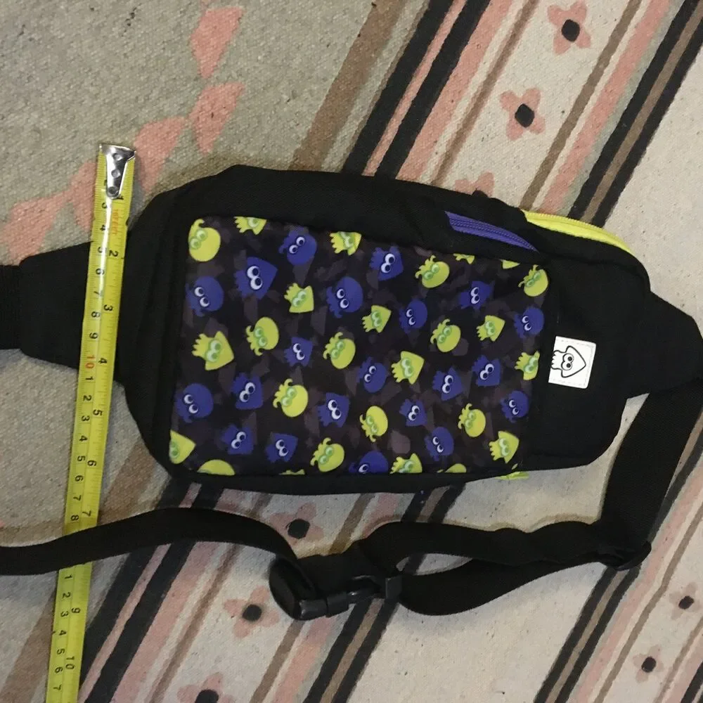 Nintendo Switch carrying case crossbody sling back blue green squids on black